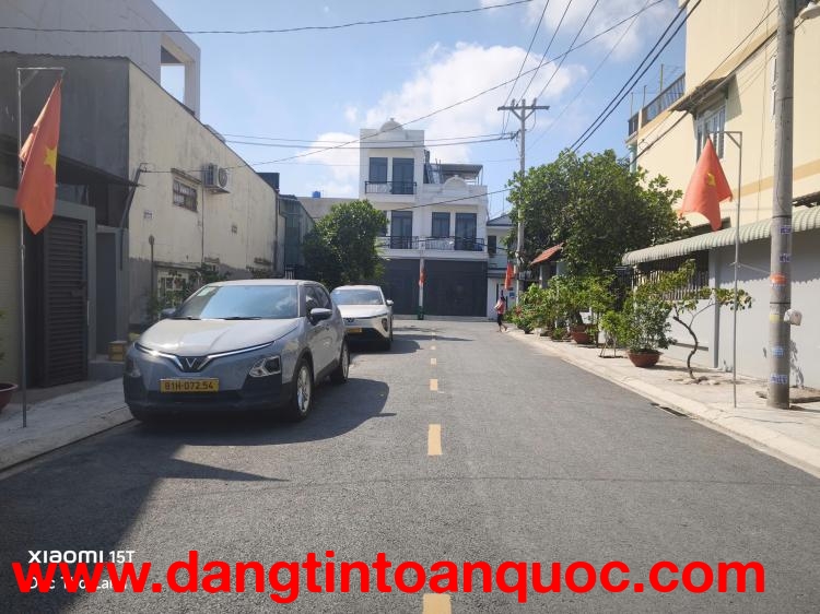 Bán lô đất đẹp đường nhựa 12m TX52 cạnh Sông mát mẻ, 5x23m full thổ cư giá 50tr/m2