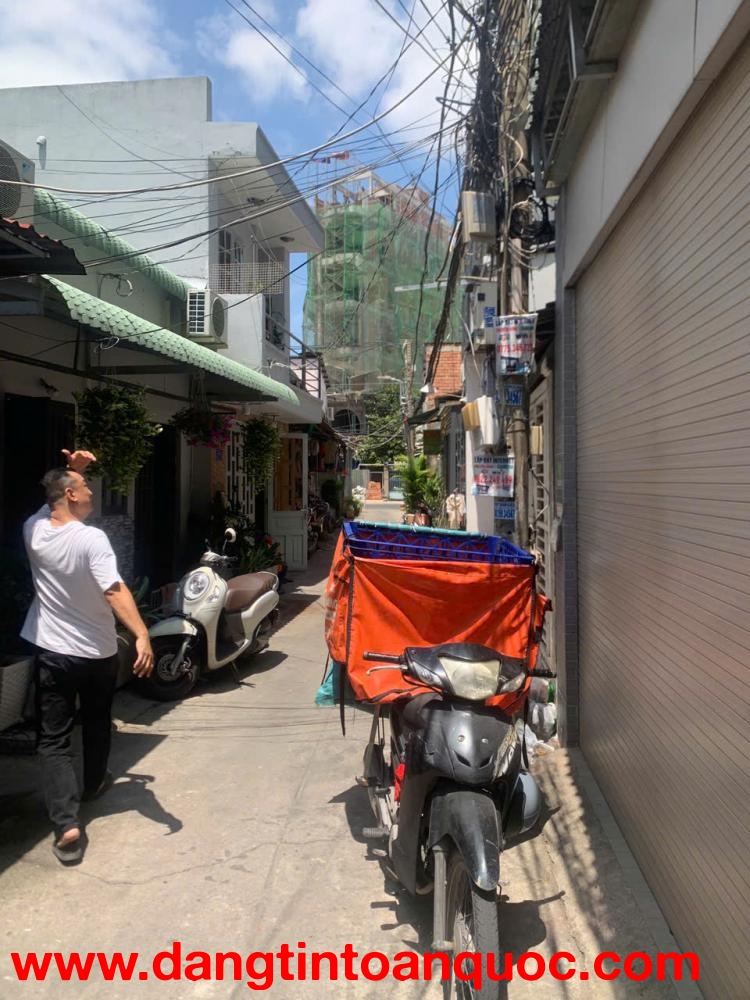 BÁN GẤP DÃY PHÒNG TRỌ 14 PHÒNG – QUẬN 7, THU NHẬP ỔN ĐỊNH