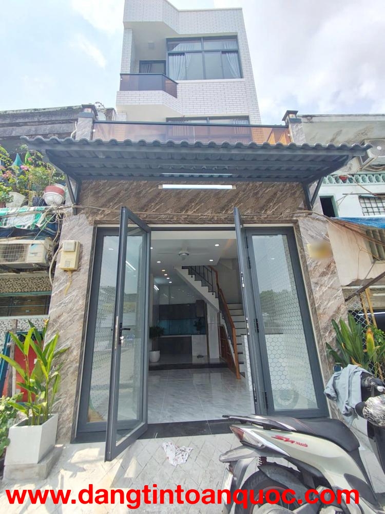 Nhà mới 4 tầng mặt tiền đường Ụ Cây P10 Q8. Giá: 5.8 tỷ